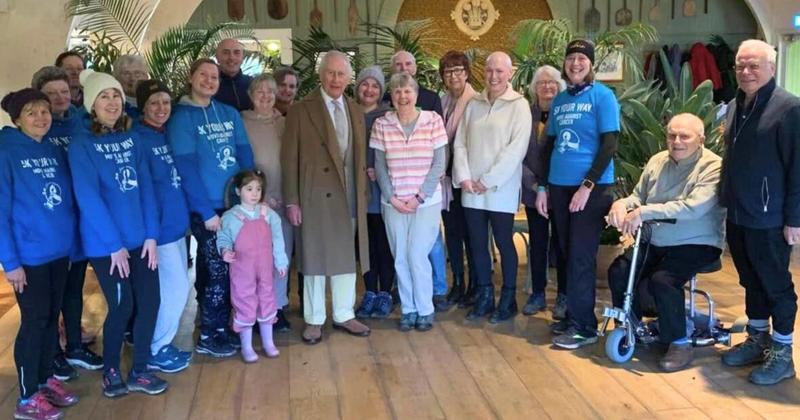 Runners treated to royal surprise as King stops by for cake